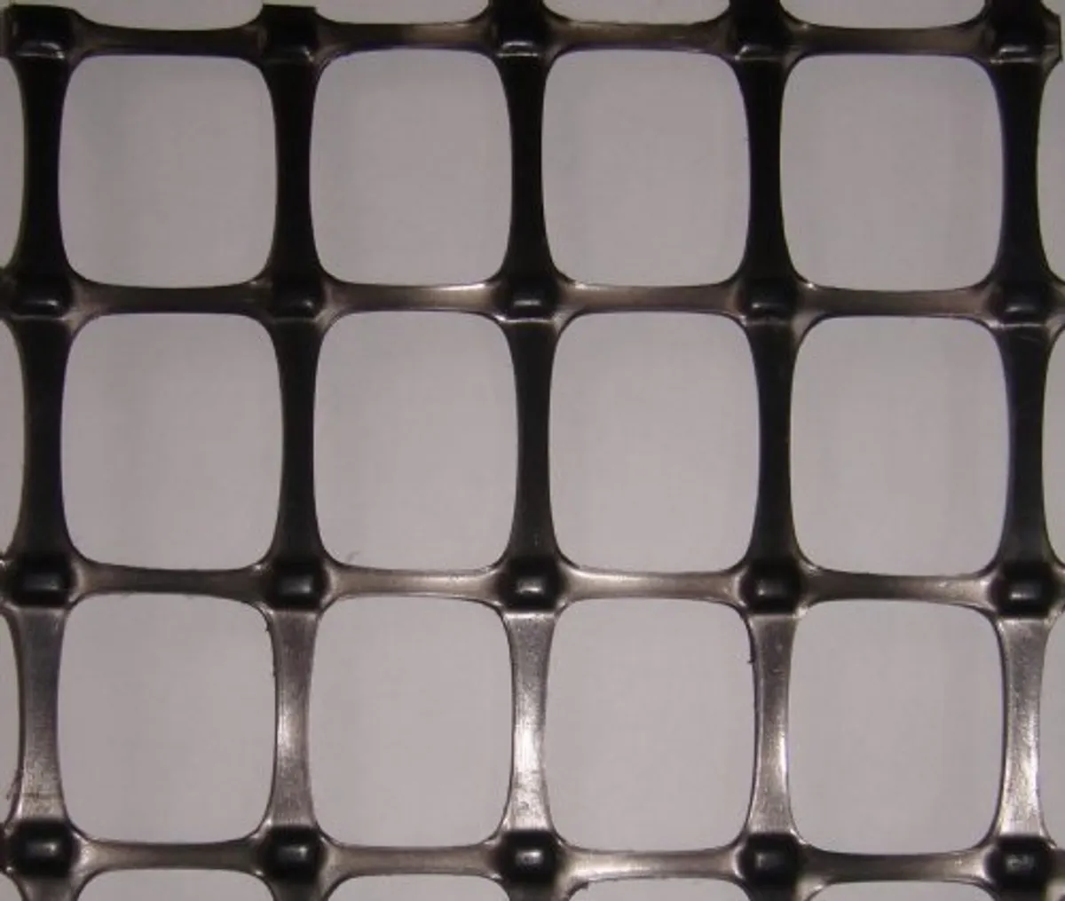 Geogrid, geotextile and geocell samples side by side for comparison
